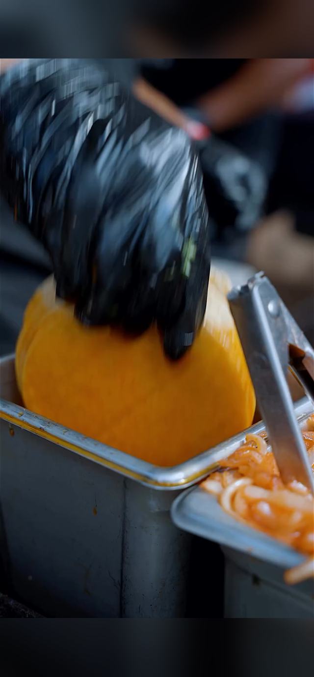 Plating tacos at Lakeview Taco Fest